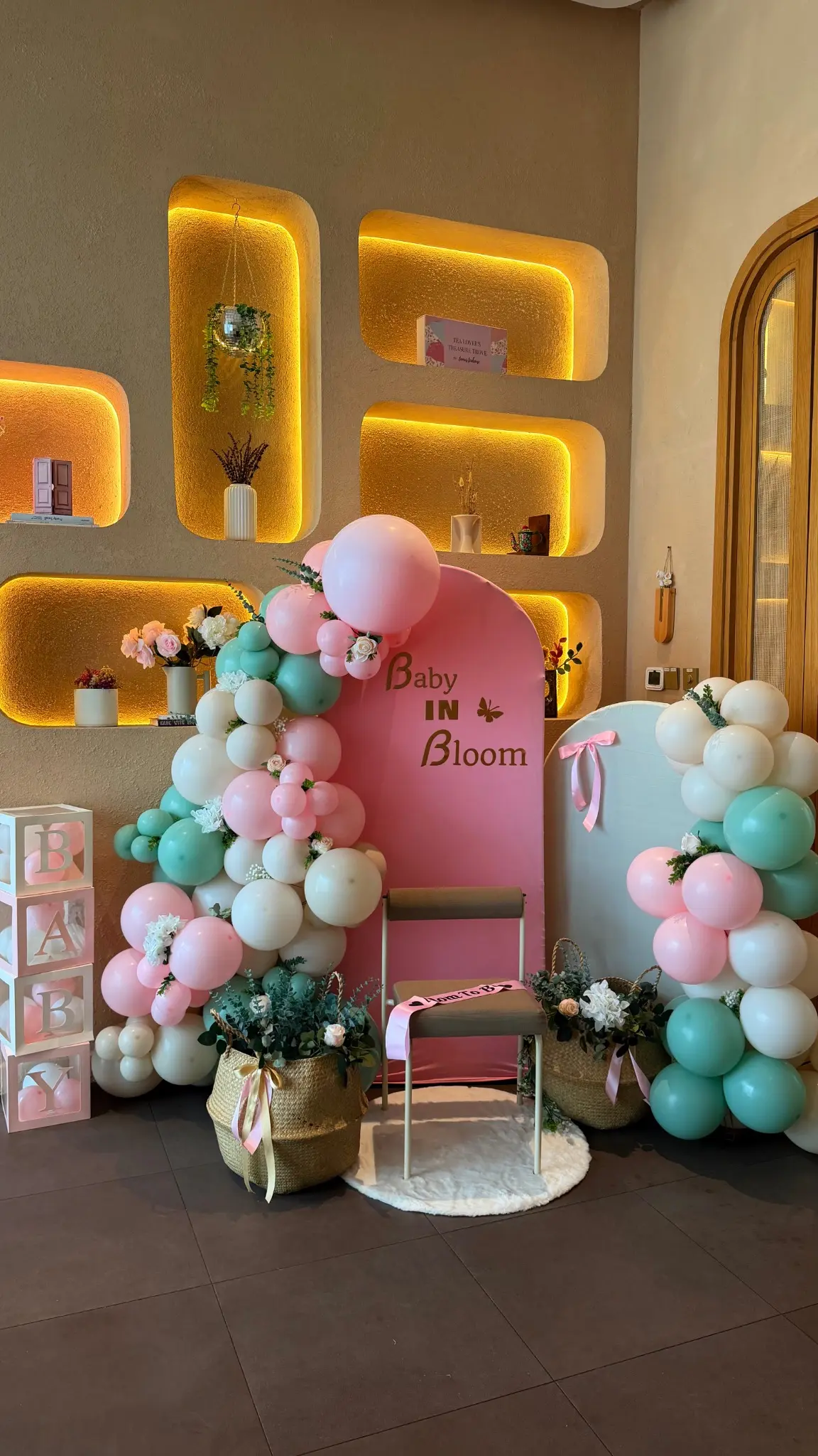 Baby in Bloom complete baby shower setup in soft pink, ivory and mint green